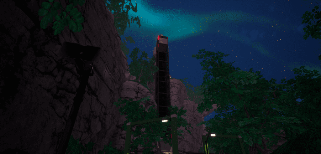 An elevator against a mountain in the night
